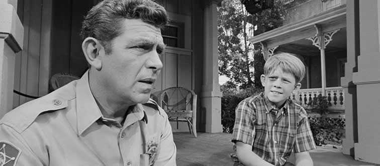 Close your eyes and listen—if you hear that legendary, pitch-perfect whistle, you’re instantly transported to this small-town classic. Can you name it?