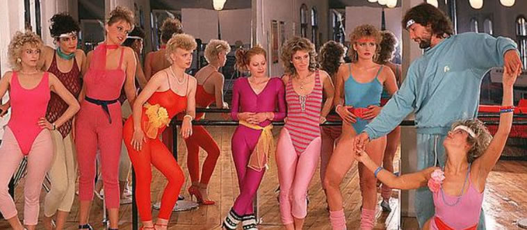 Which neon-clad 1980s workout craze had everyone busting a move to chart-toppers in their living rooms?