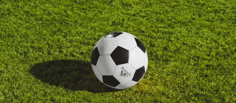 Spotted on the pitch! Can you name this legendary icon of the beautiful game?
