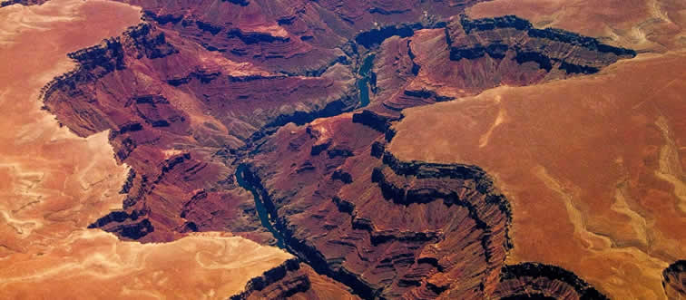 Which state hosts this legendary natural stage, the world-famous Grand Canyon?