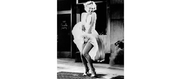 That iconic moment in the white "subway grate" dress.